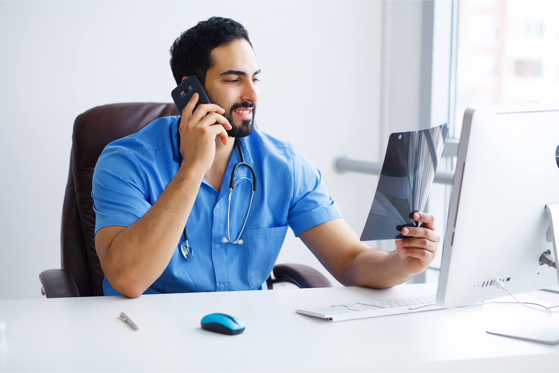 Portrait Of Young Doctor Sitting In Medical Office 2023 11 27 05 18 17 Utc