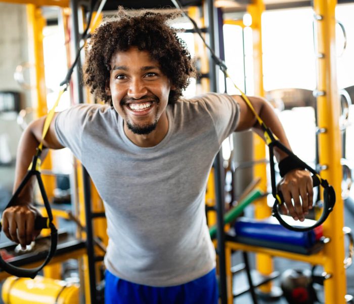 Services man-training-with-trx-fitness-straps-in-the-gym-w-2023-11-27-05-28-58-utc-1.jpg