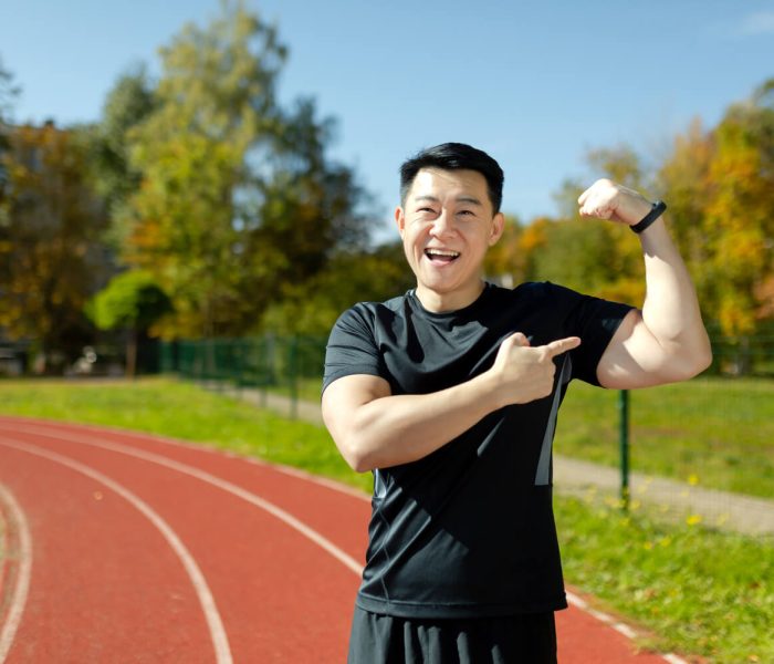 Services portrait-of-asian-young-male-athlete-standing-on-s-2023-11-27-05-06-38-utc-1.jpg